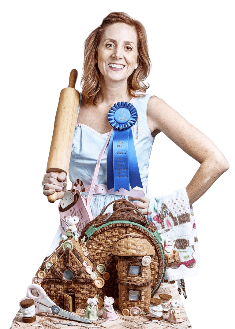 Woman with rolling pin and gingerbread houses.
